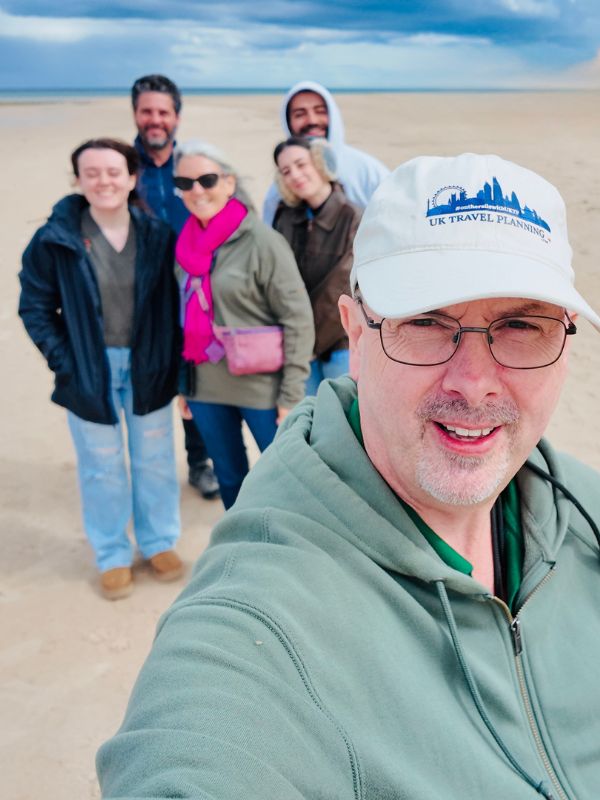 Doug and tour group on beach