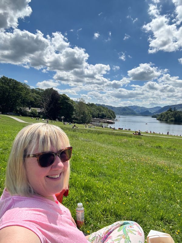 Picnic on the grass above Derwentwater near Keswick