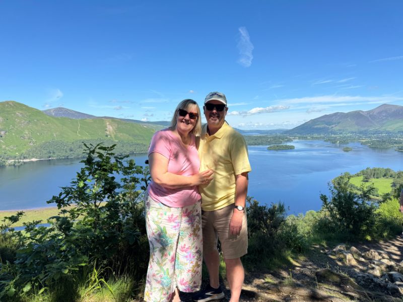 Tracy and Doug Collins looking out over Derwentwater on the Ten Lakes tour